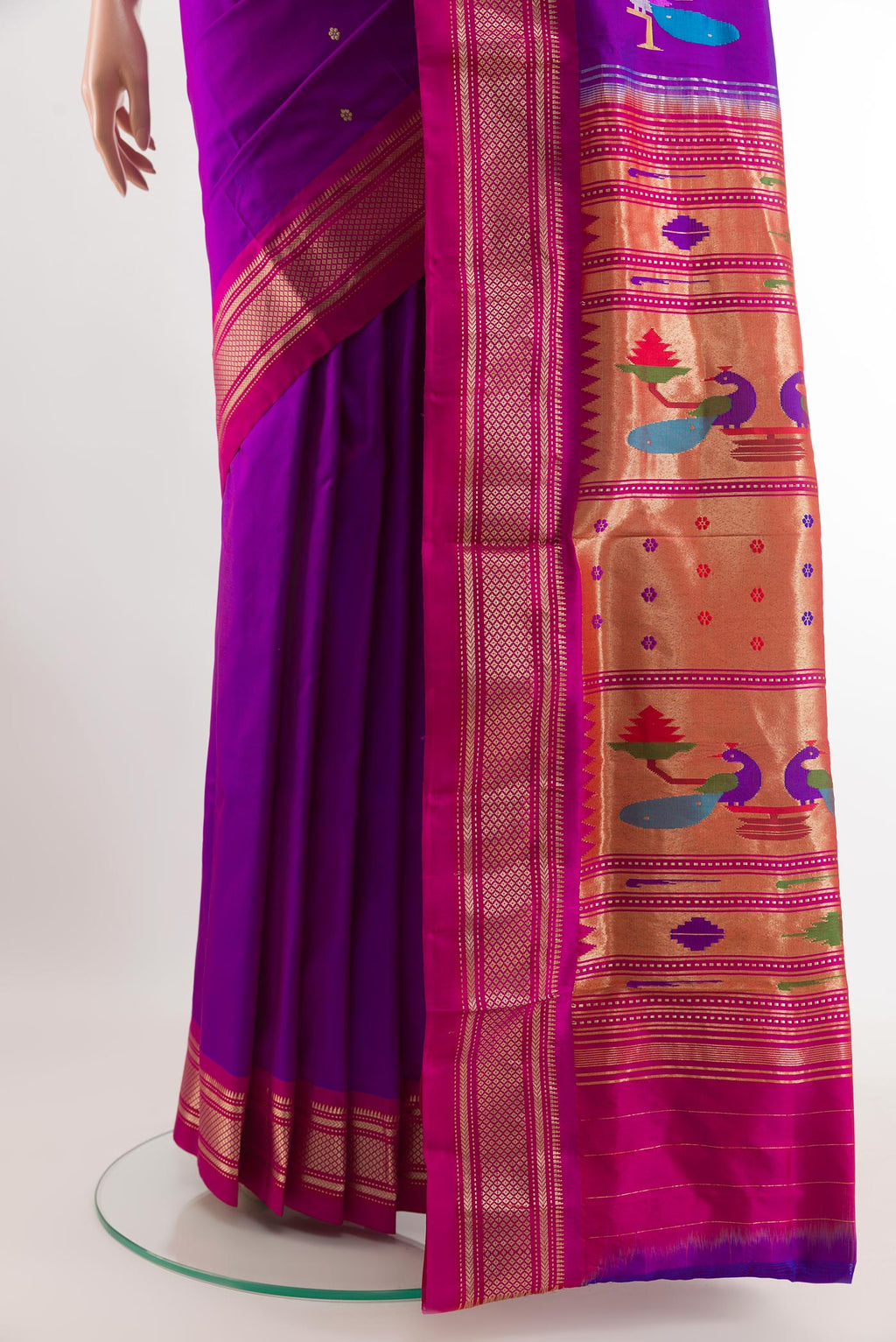 Pleats and pallu of Purple Paithani Silk Saree with Zari Butta on the body and Zari Border. 