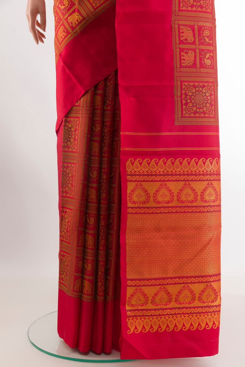 Pleats and pallu of Red Kanjivaram Silk Saree with Jacquard design on the body and Plain Border. 