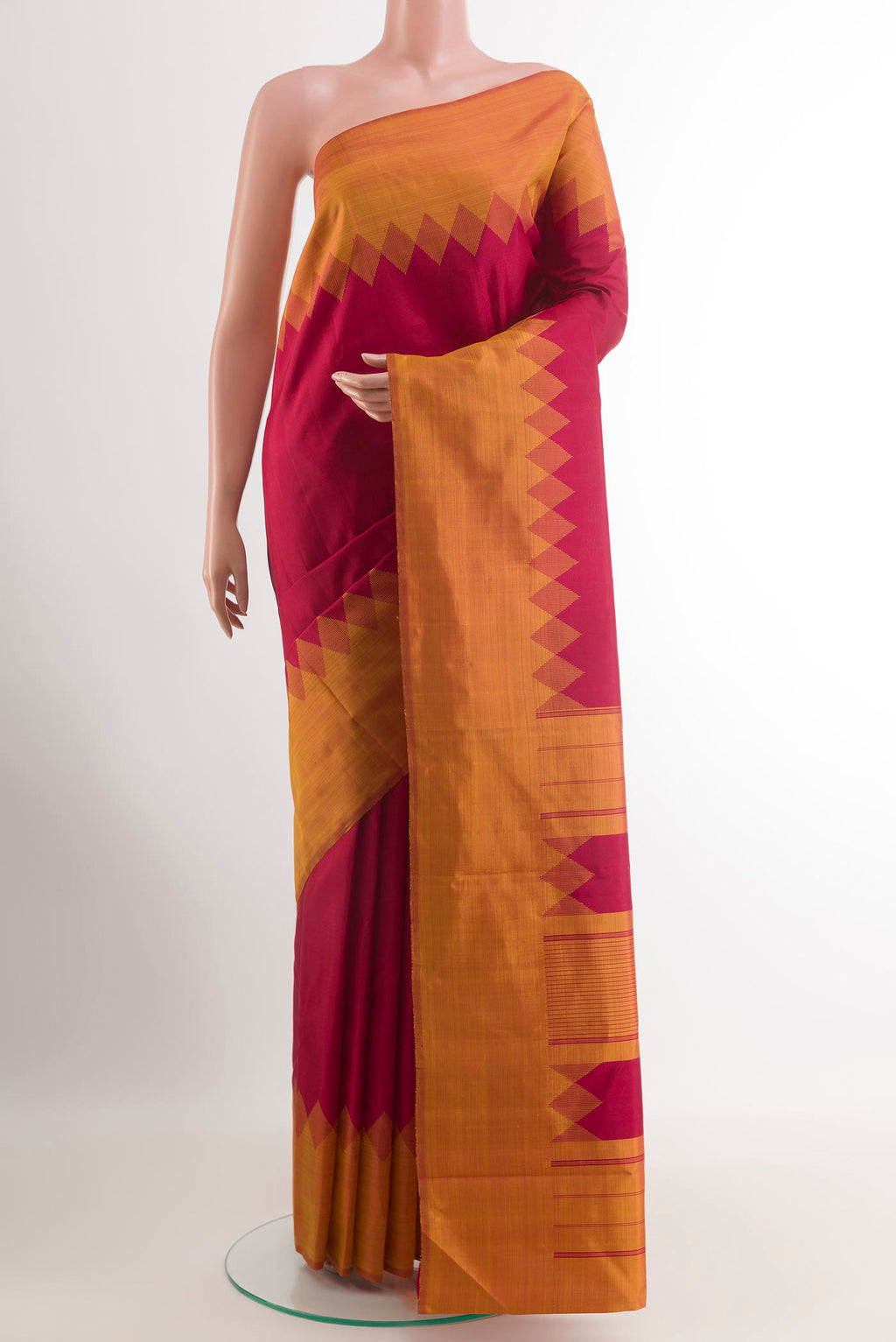 Maroon Kanjivaram Silk Saree with Plain Body and Temple Border.  displayed on a mannequin