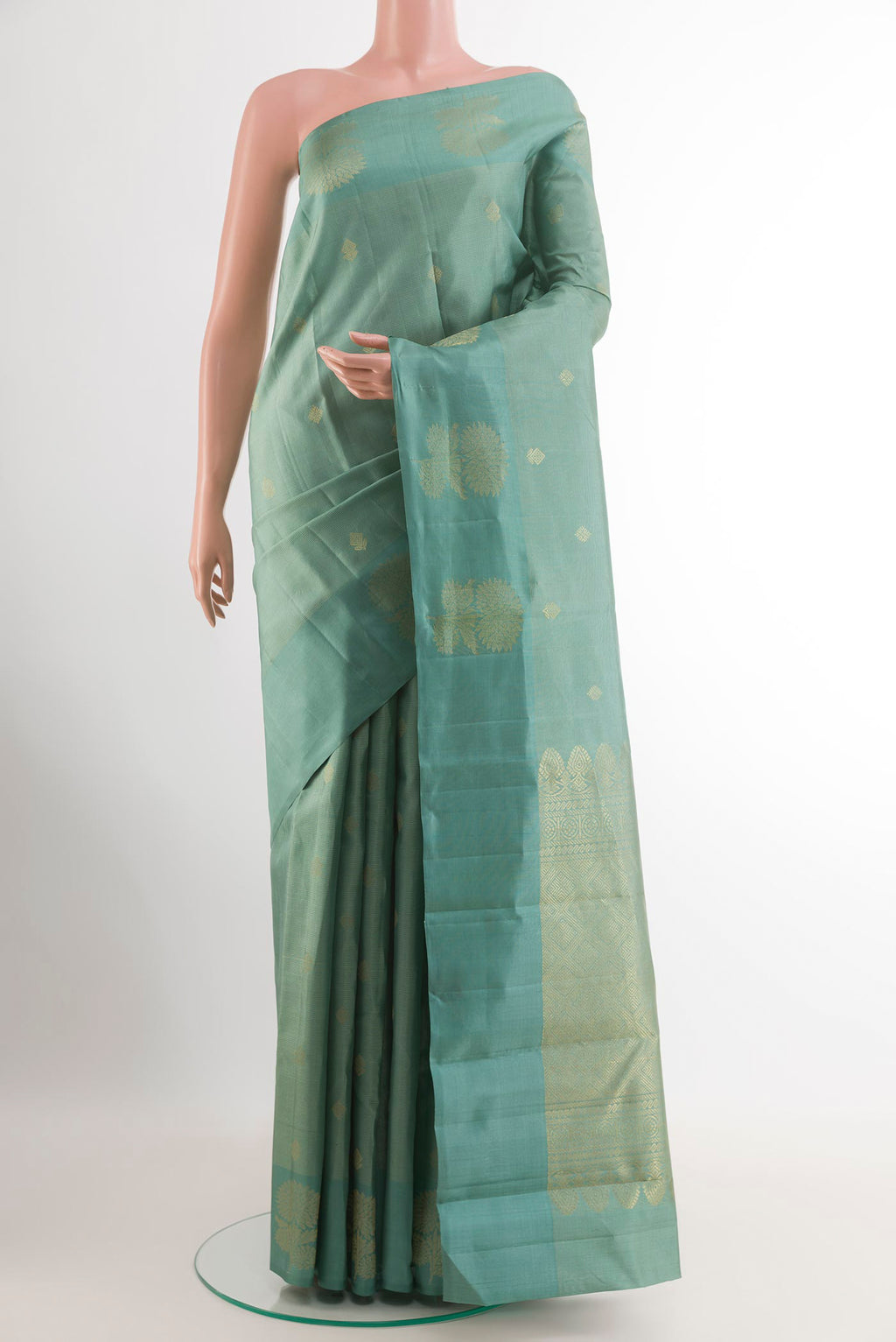 Blue Grey Kanchipuram Silk Saree with Zari Butta on the body and Zari Border.  displayed on a mannequin