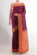 Purple Kanchipuram Silk Saree with Checked design on the body and Zari Border.  displayed on a mannequin