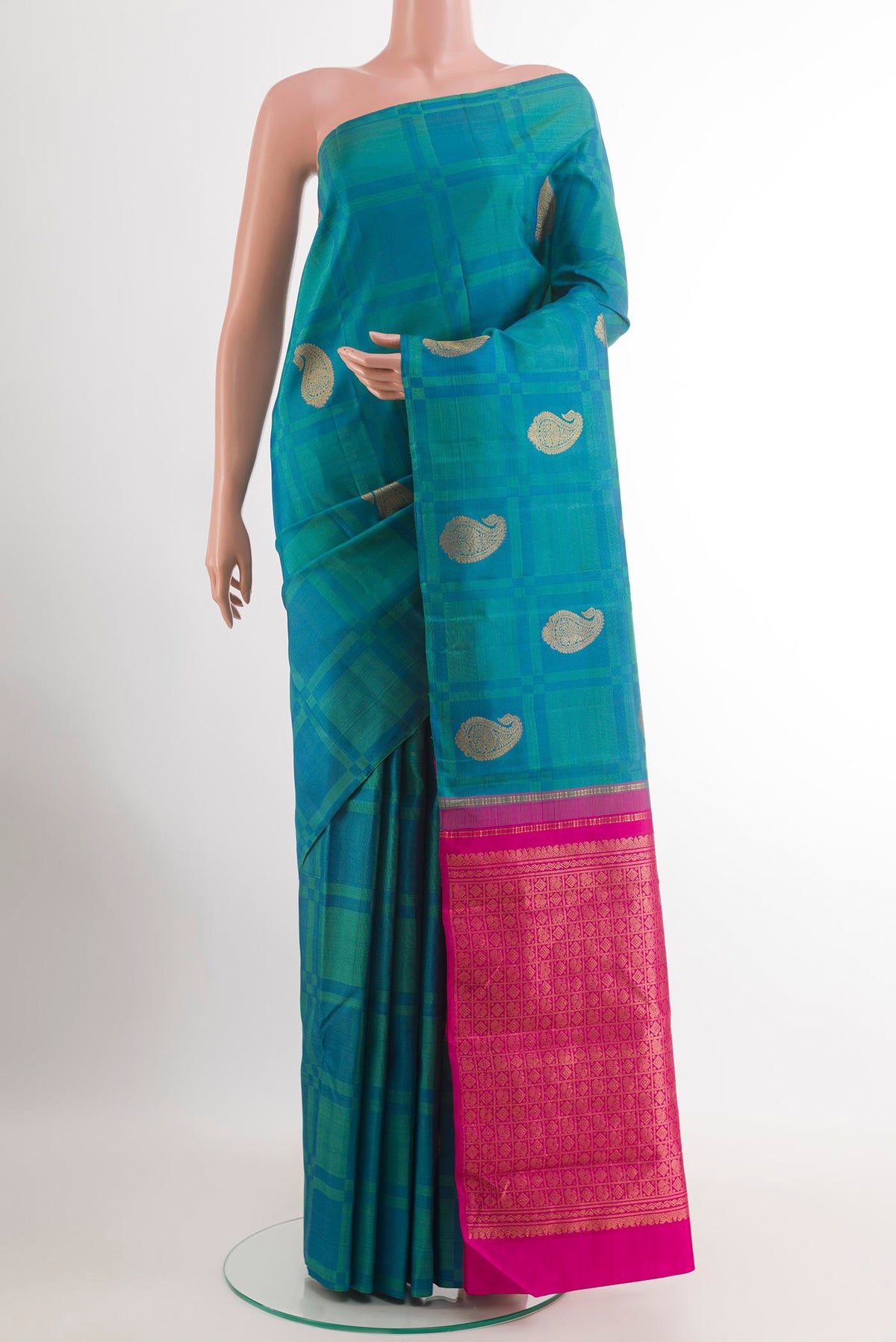 Peacock Blue Kanchipuram Silk Saree with Checked design on the body and Without Border.  displayed on a mannequin
