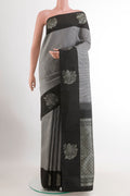 Multi Color Kanjivaram Silk Saree with Checked design on the body and Zari Border.  displayed on a mannequin