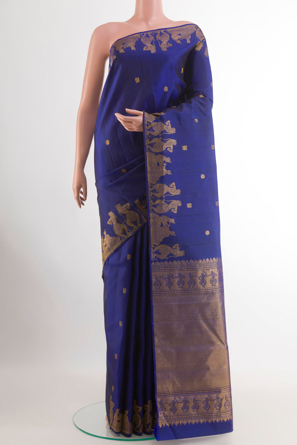 Blue Kanjivaram Silk Saree with Zari Butta on the body and Fancy Border.  displayed on a mannequin
