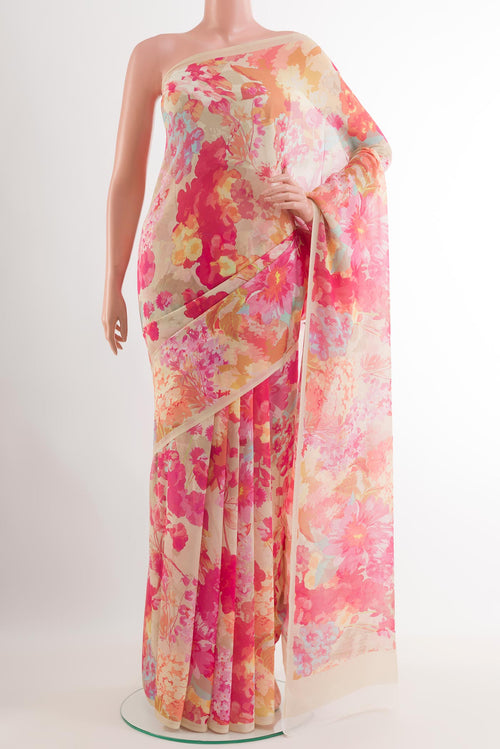 Beige Chiffon Saree with Printed design on the body and Plain Border.  displayed on a mannequin