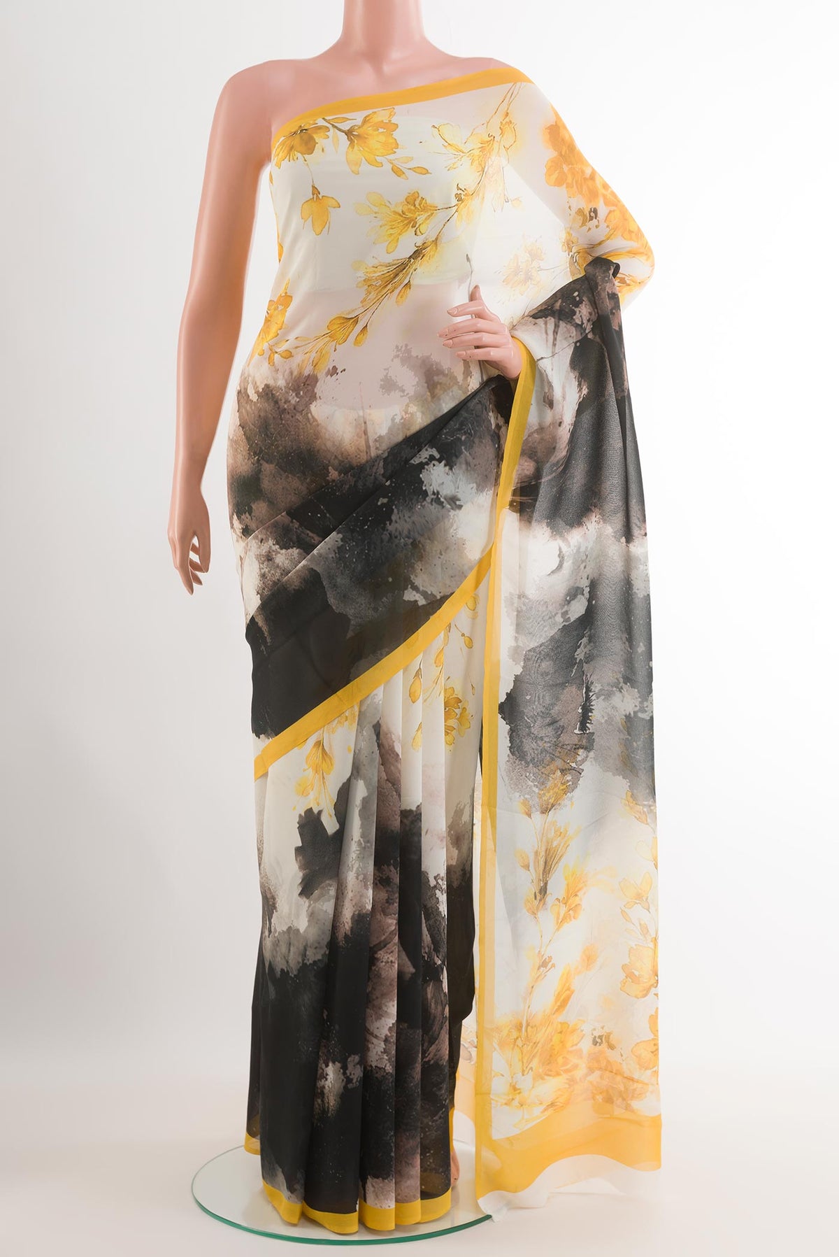 Off White Chiffon Saree with Printed design on the body and Plain Border.  displayed on a mannequin
