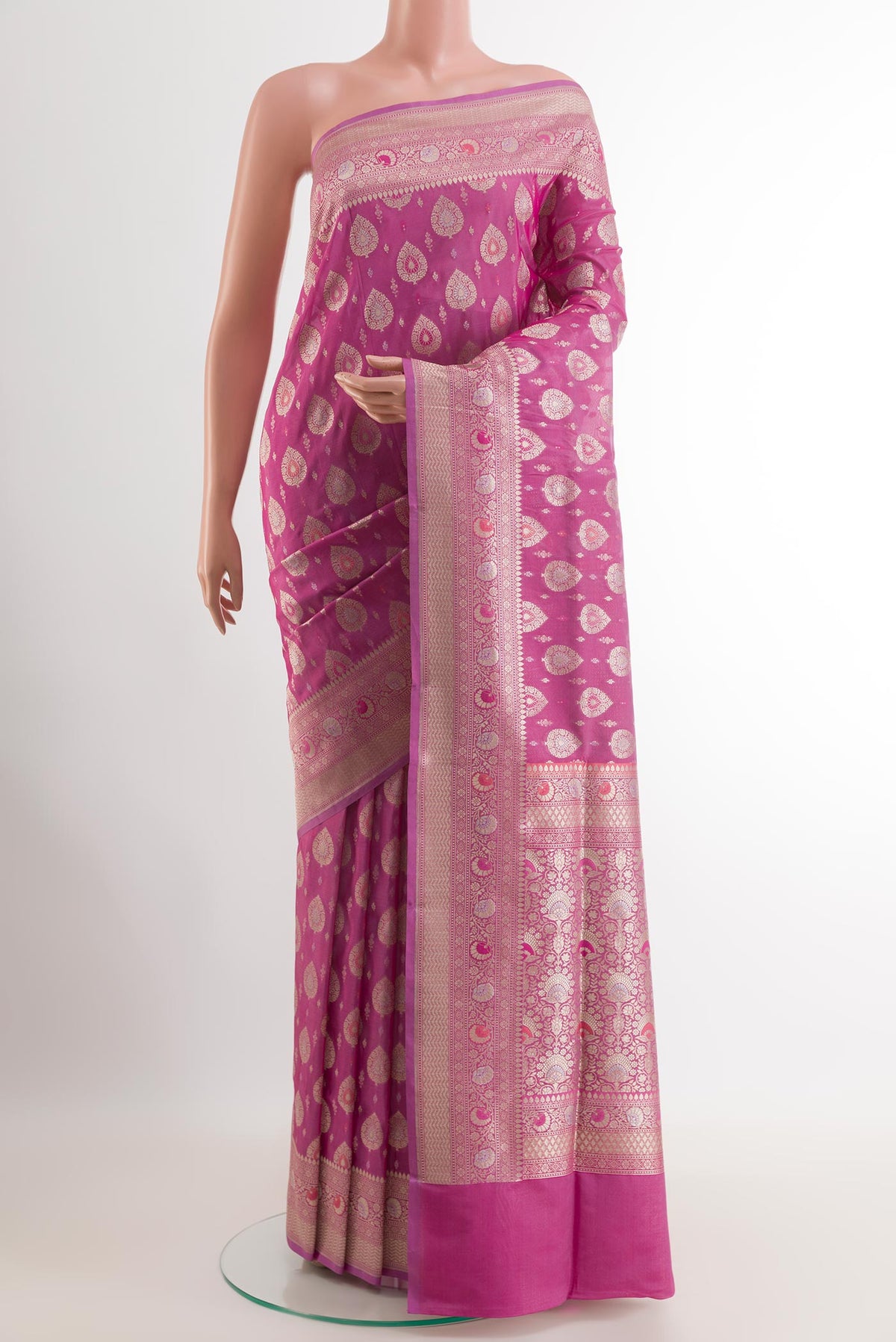 Pink Banarasi Silk Saree with Zari Butta on the body and Zari Border.  displayed on a mannequin