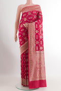 Red Banarasi Silk Saree with Zari Butta on the body and Zari Border.  displayed on a mannequin