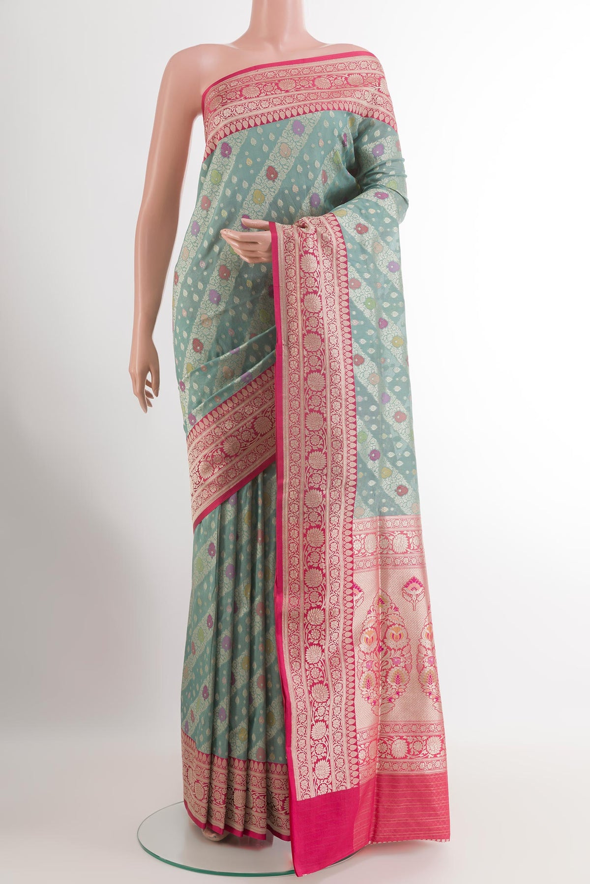 Grey Banarasi Silk Saree with Zari Brocade on the body and Zari Border.  displayed on a mannequin