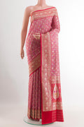 Pink Banarasi Silk Saree with Zari Butta on the body and Zari Border.  displayed on a mannequin