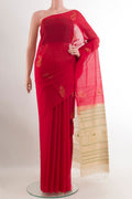 Red Blended Kora Cotton Saree with Thread Butta on the body and Zari Border.  displayed on a mannequin