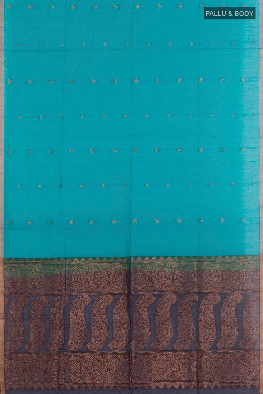 Flat view of Blue Silk Cotton Saree with Zari Butta on the body and Zari Border. 