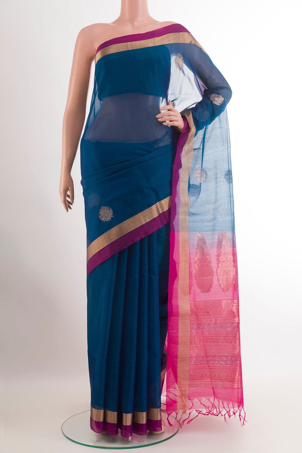 Dark Blue Blended Kora Cotton Saree with Zari Butta on the body and Zari Border.  displayed on a mannequin