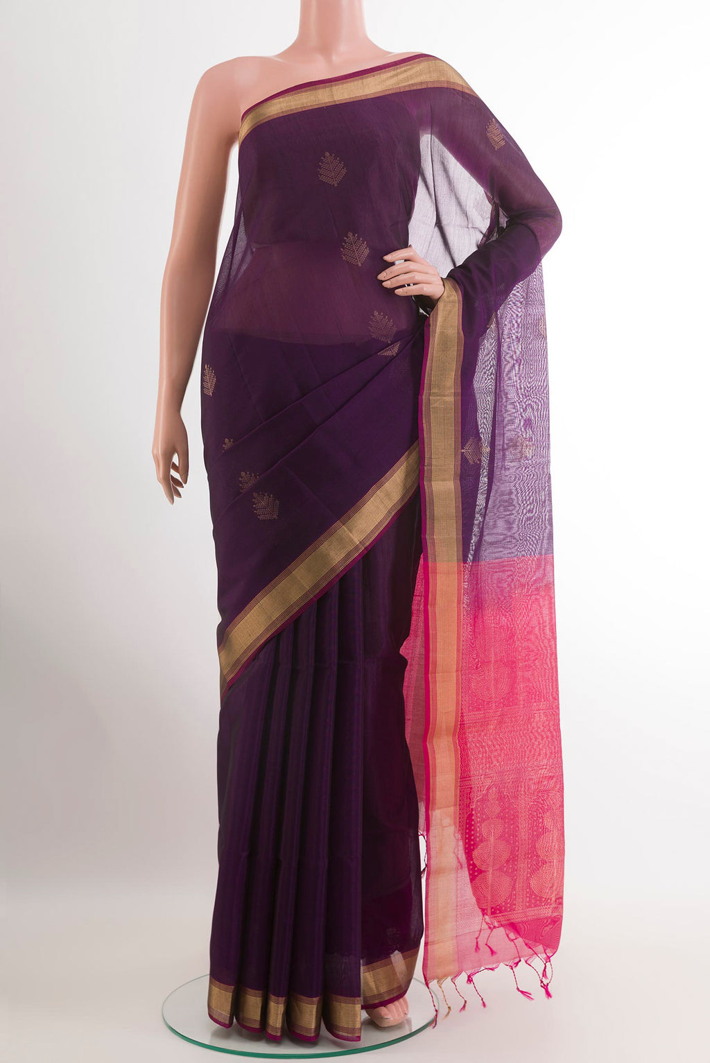 Purple Silk Cotton Saree with Zari Butta on the body and Zari Border.  displayed on a mannequin