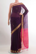Purple Silk Cotton Saree with Zari Butta on the body and Zari Border.  displayed on a mannequin