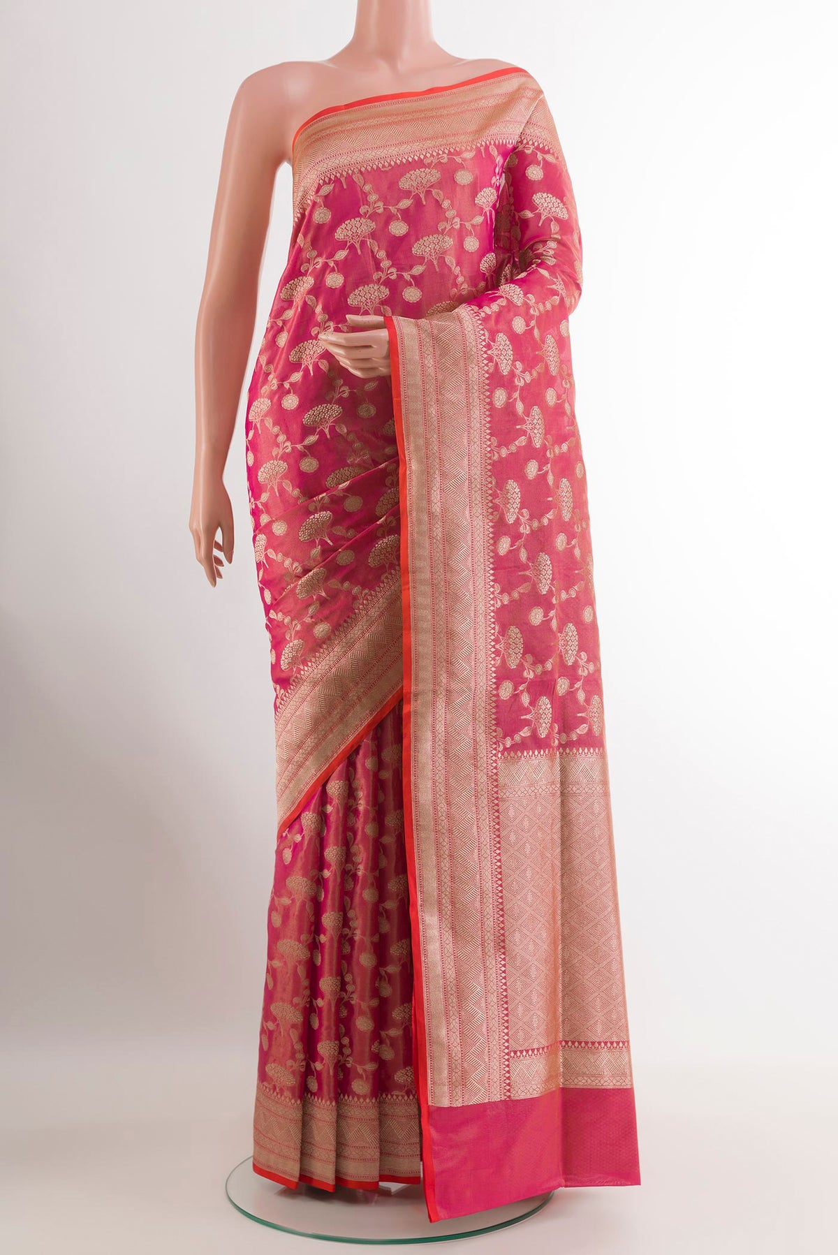 Pink with Orange Color Banarasi Silk Saree with Zari Brocade on the body and Zari Border.  displayed on a mannequin