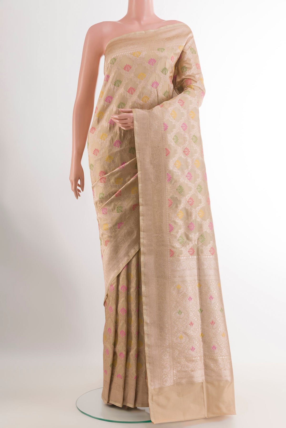 Beige Banarasi Silk Saree with Zari Brocade on the body and Zari Border.  displayed on a mannequin