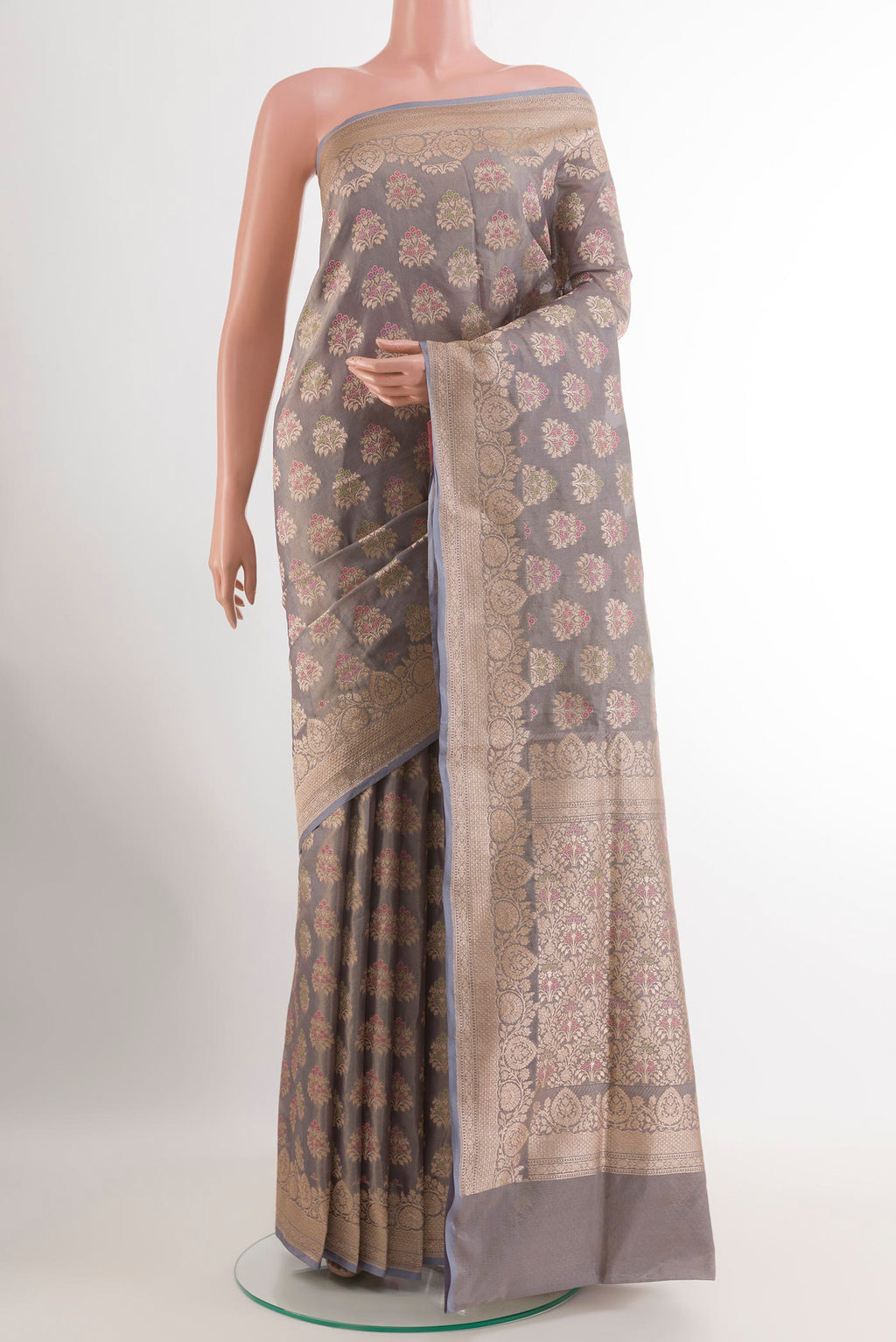 Grey Banarasi Silk Saree with Zari Brocade on the body and Zari Border.  displayed on a mannequin