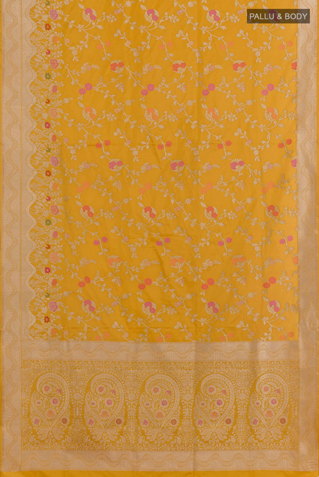 Flat view of Mustard Banarasi Silk Saree with Zari Butta on the body and Zari Border. 