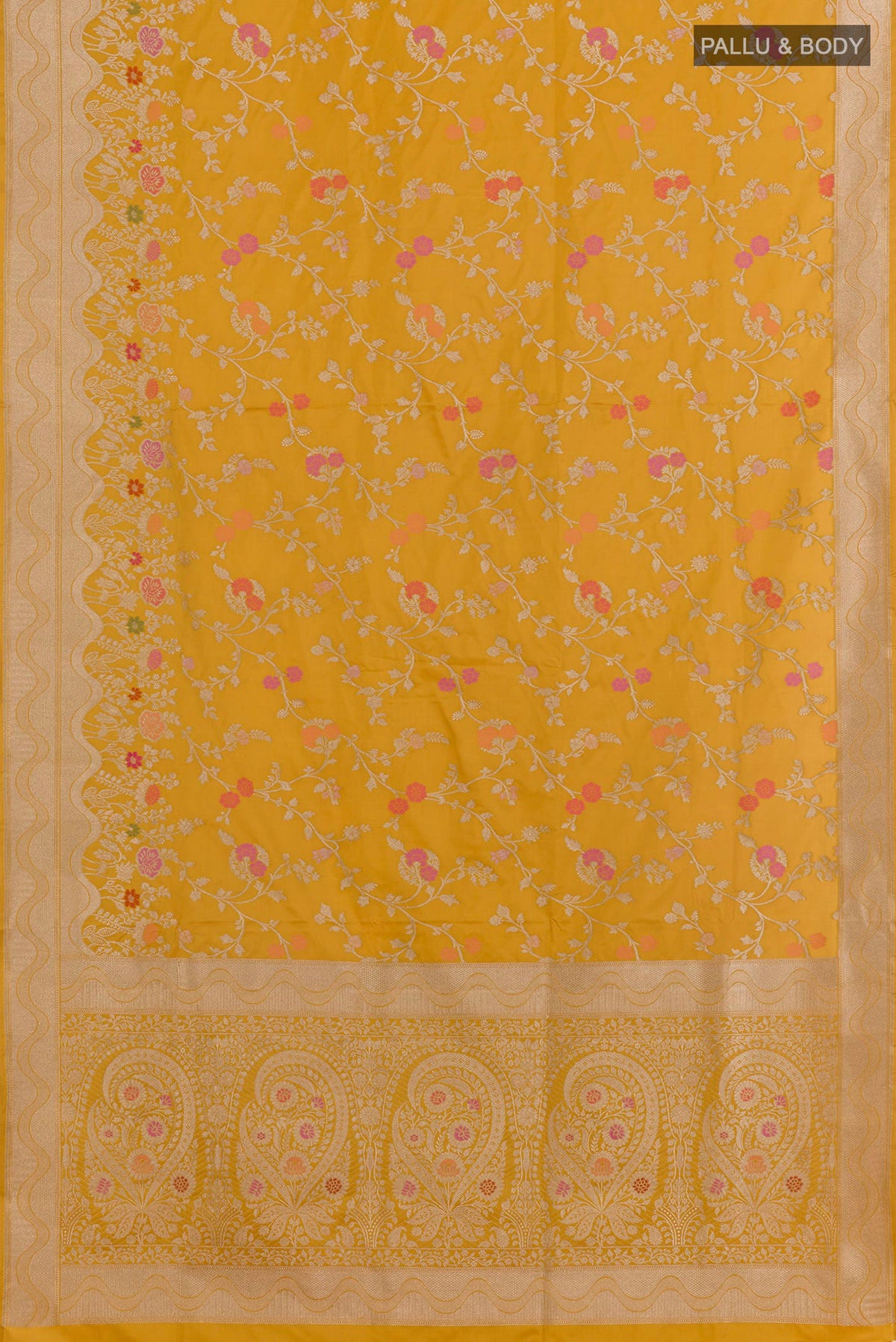 Flat view of Mustard Banarasi Silk Saree with Zari Butta on the body and Zari Border. 