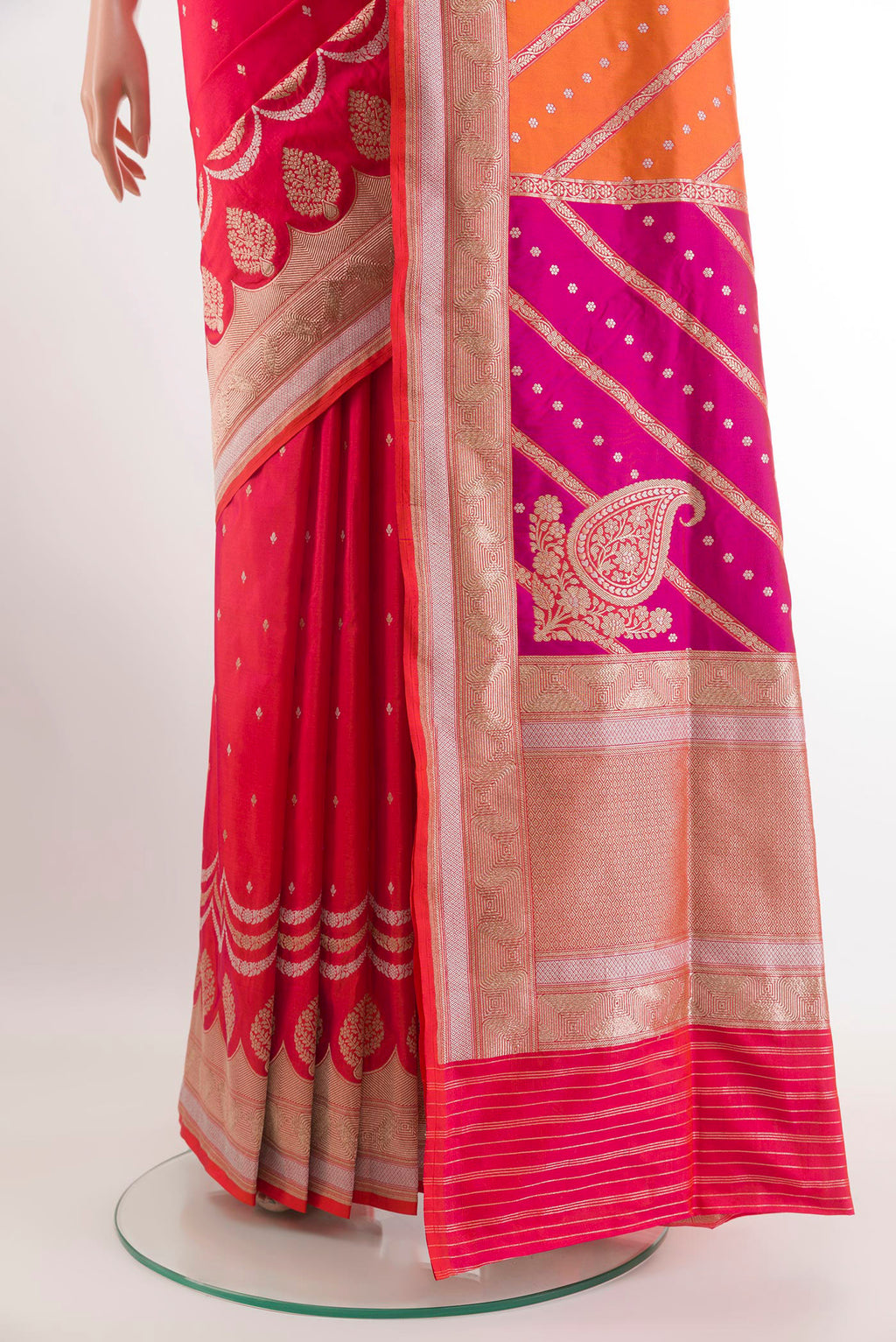 Pleats and pallu of Pink with Orange Color Banarasi Silk Saree with Zari Butta on the body and Zari Border. 