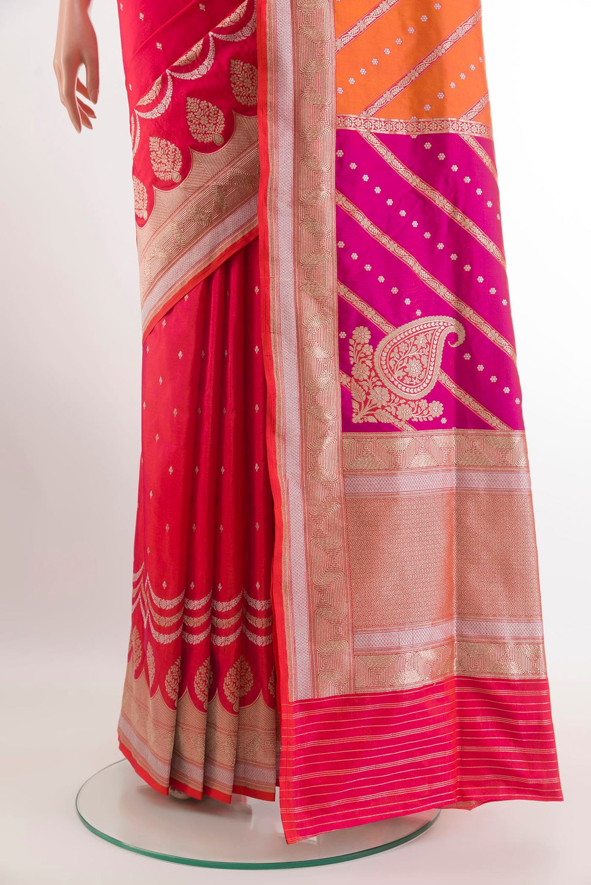 Pleats and pallu of Pink with Orange Color Banarasi Silk Saree with Zari Butta on the body and Zari Border. 