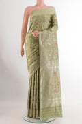 Sage Green Banarasi Silk Saree with Zari Brocade on the body and Zari Border.  displayed on a mannequin