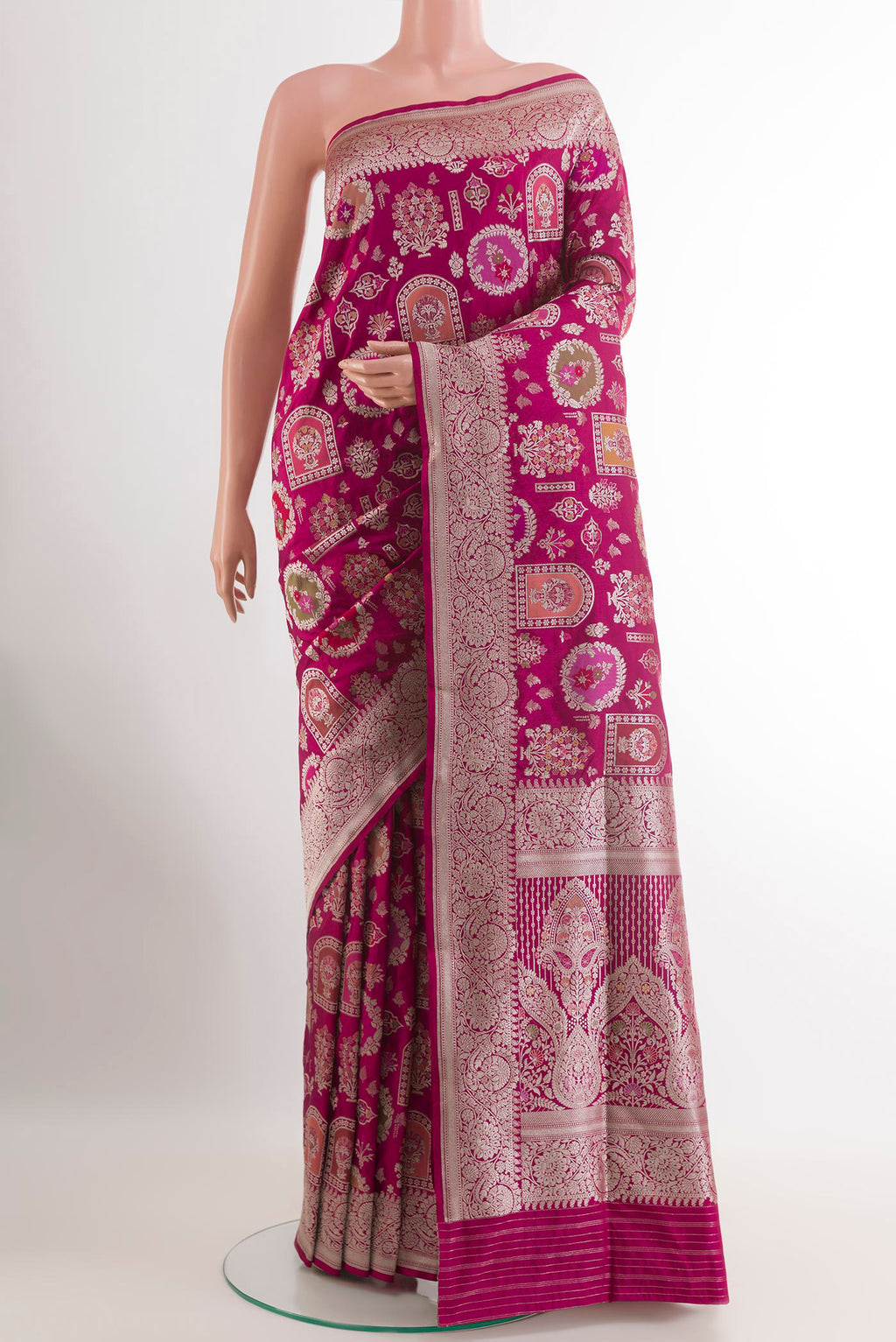 Magenta Banarasi Silk Saree with Zari Brocade on the body and Zari Border.  displayed on a mannequin