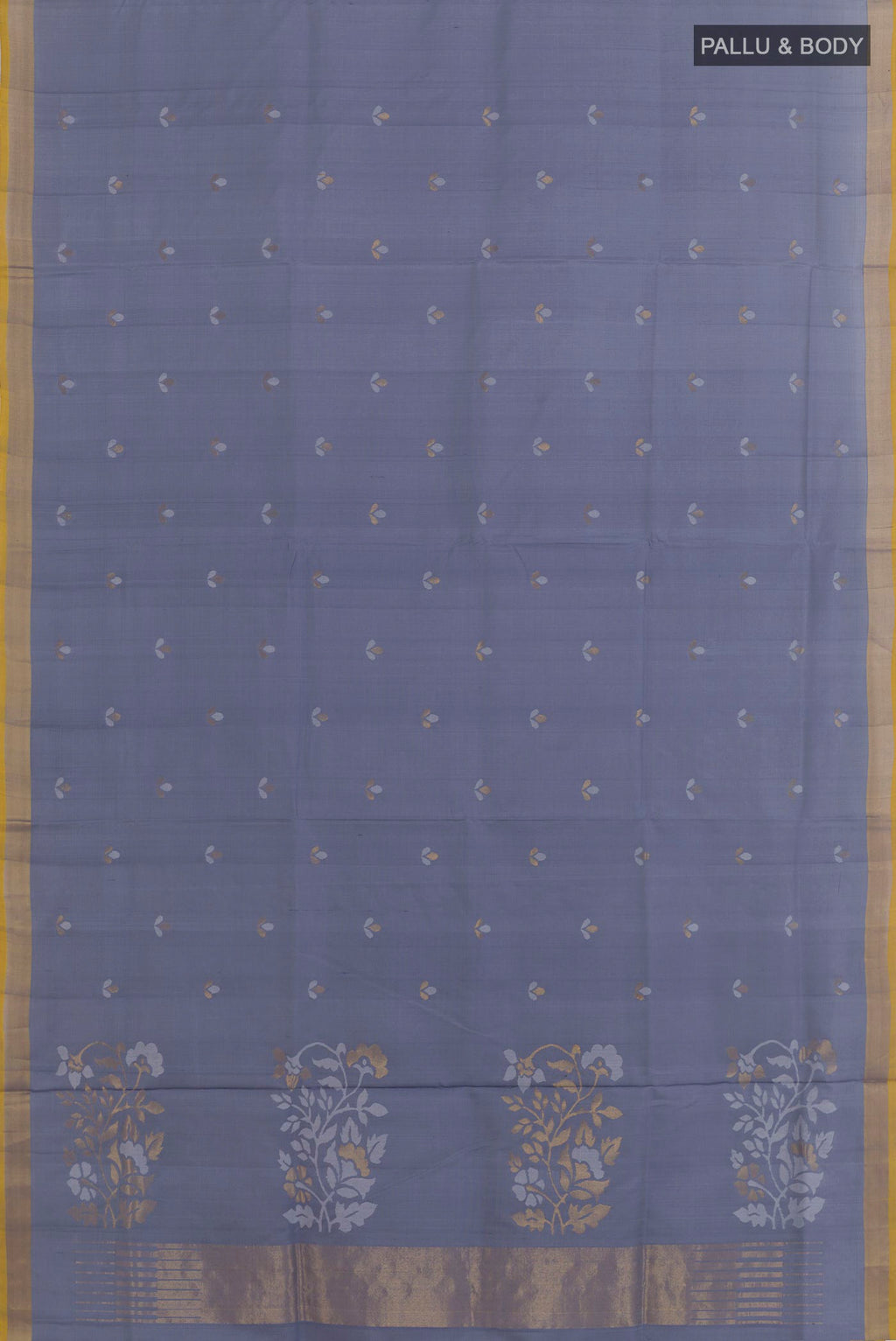 Flat view of Blue Grey Uppada Silk Saree with Zari Butta on the body and Zari Border. 