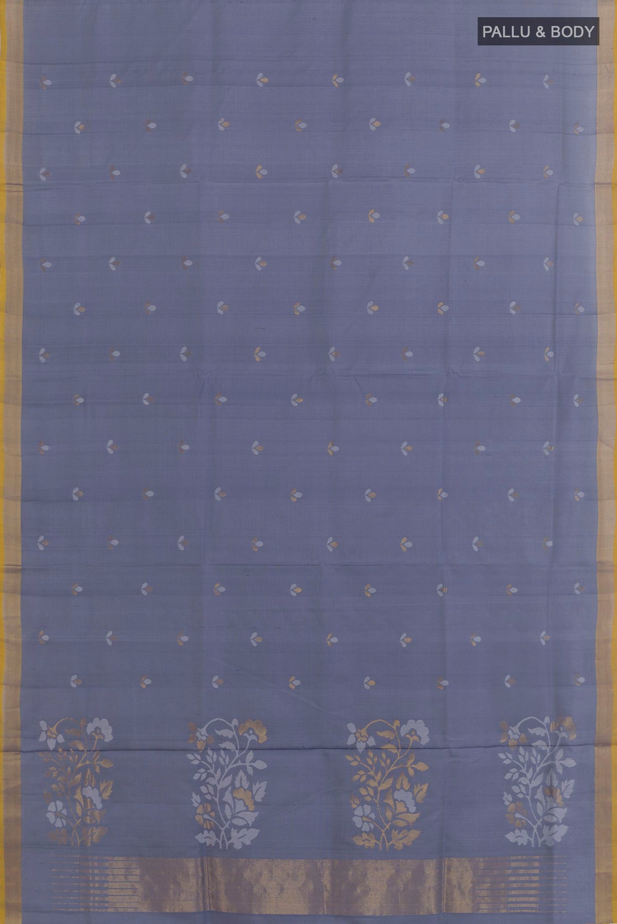 Flat view of Blue Grey Uppada Silk Saree with Zari Butta on the body and Zari Border. 