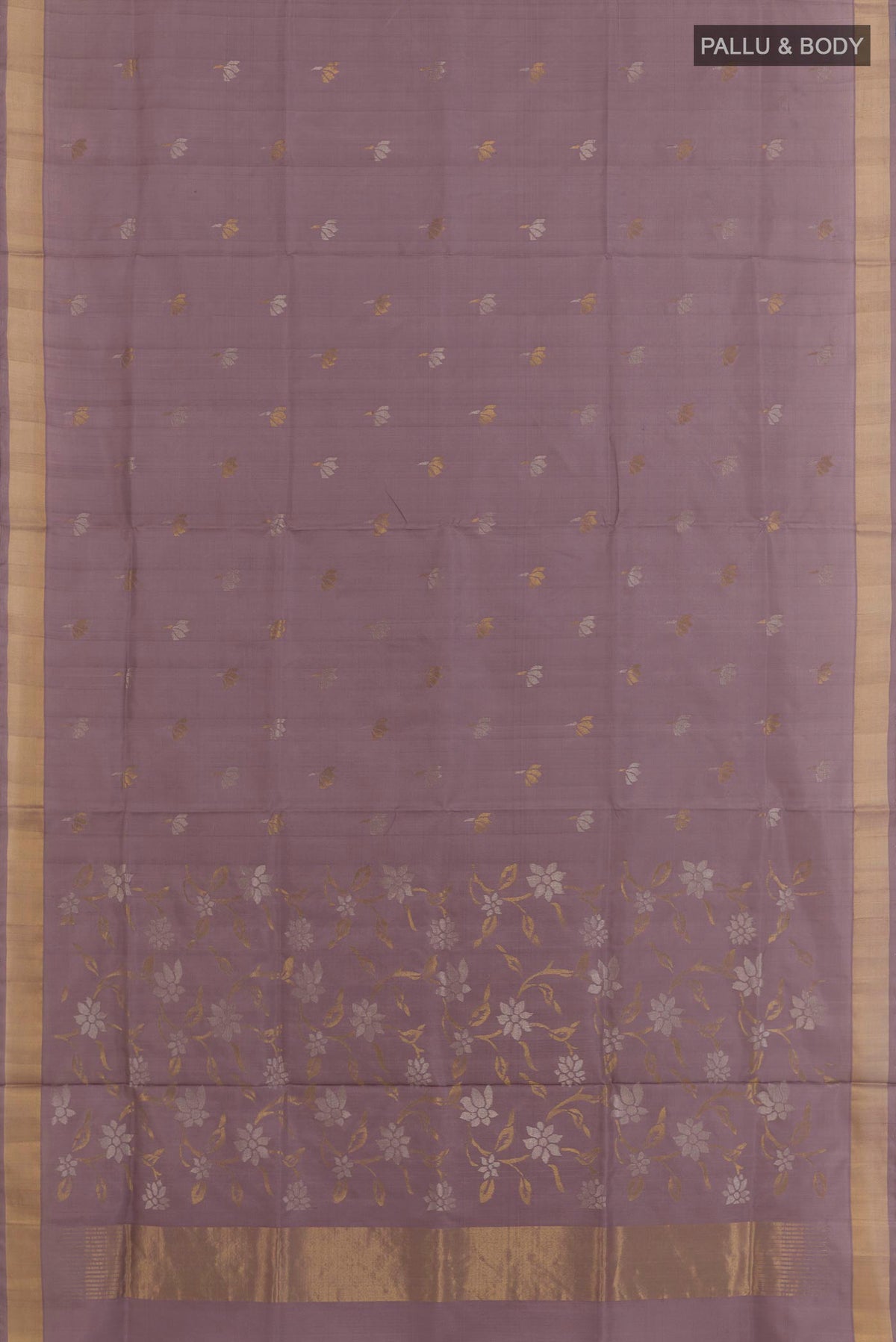 Flat view of Lavender Uppada Silk Saree with Zari Butta on the body and Zari Border. 