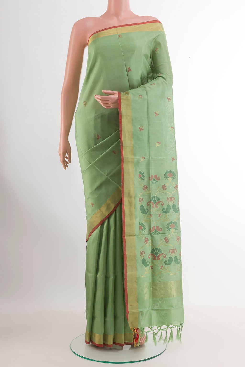 Green Uppada Silk Saree with Zari Butta on the body and Zari Border.  displayed on a mannequin