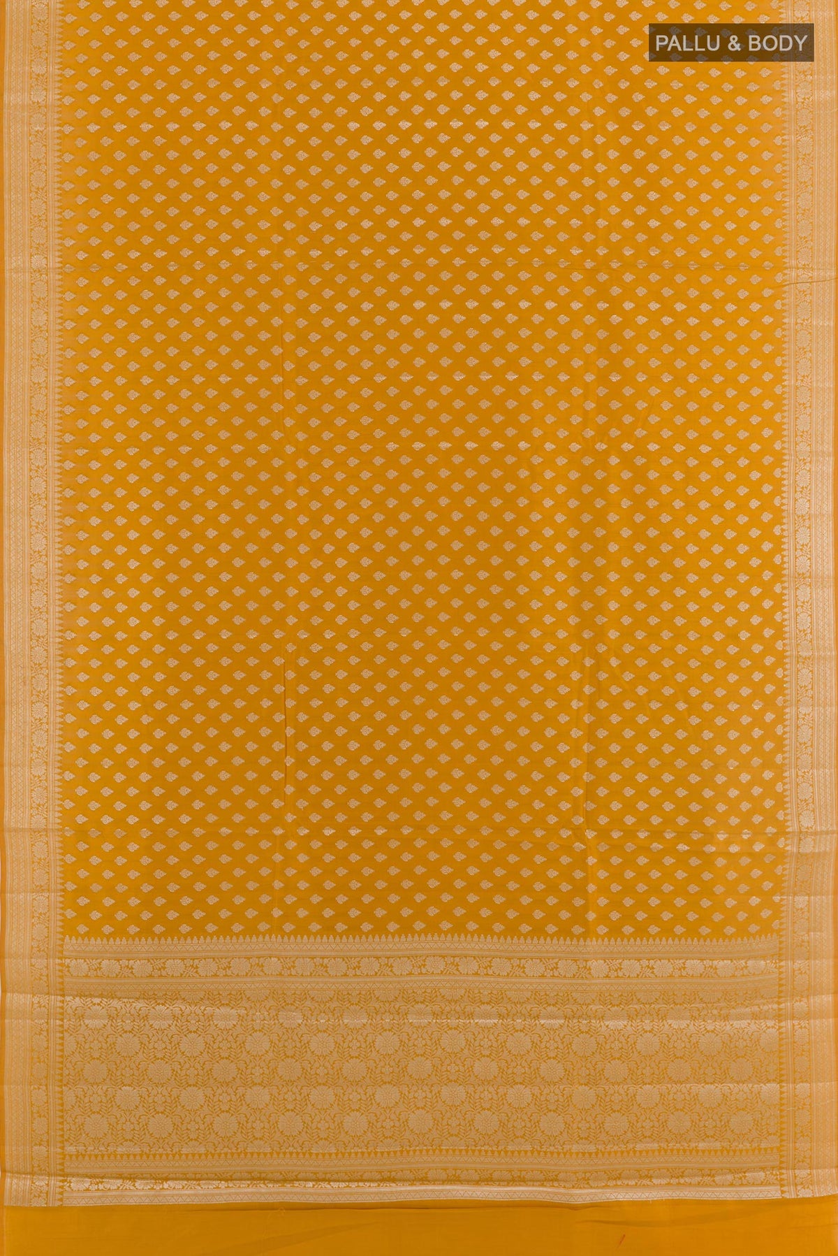 Flat view of Yellow Tussar Silk Saree with Zari Butta on the body and Zari Border. 