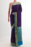 Navy Blue Mysore Chiffon Saree with Zari Butta on the body and Zari Border.  displayed on a mannequin