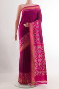 Purple Pochampally Silk Saree with Plain Body and Zari Border.  displayed on a mannequin