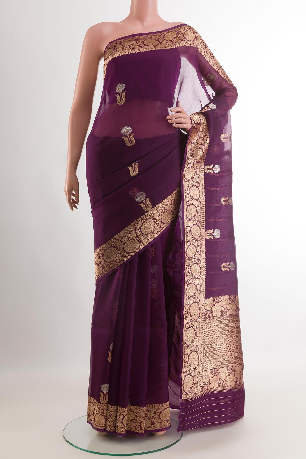 Purple Organza Silk Saree with Zari Butta on the body and Zari Border.  displayed on a mannequin