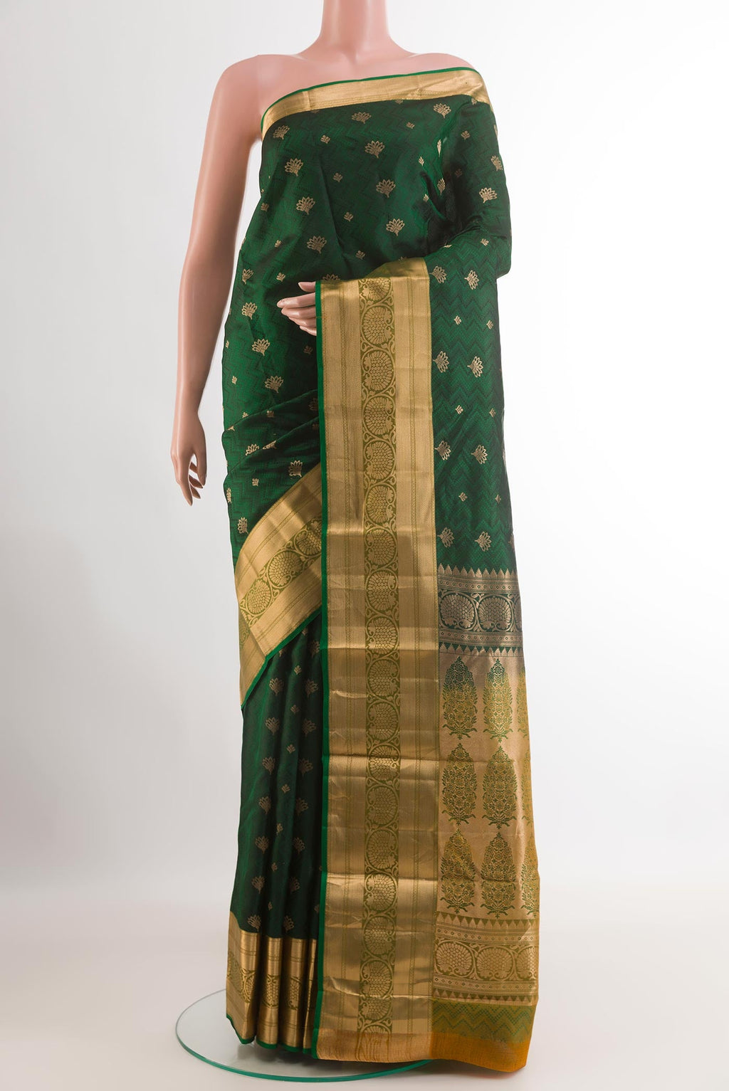 Green Kanjivaram Silk Saree with Jacquard With Zari Butta on the body and Zari Border.  displayed on a mannequin
