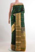 Green Kanjivaram Silk Saree with Jacquard With Zari Butta on the body and Zari Border.  displayed on a mannequin