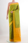 Green Kanchipuram Silk Saree with Zari Butta on the body and Zari Border.  displayed on a mannequin