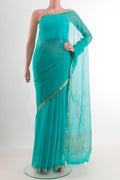 Blue Mysore Chiffon Saree with Plain Body and Zari Border.  displayed on a mannequin