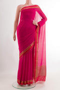 Pink Mysore Chiffon Saree with Zari Butta on the body and Zari Border.  displayed on a mannequin
