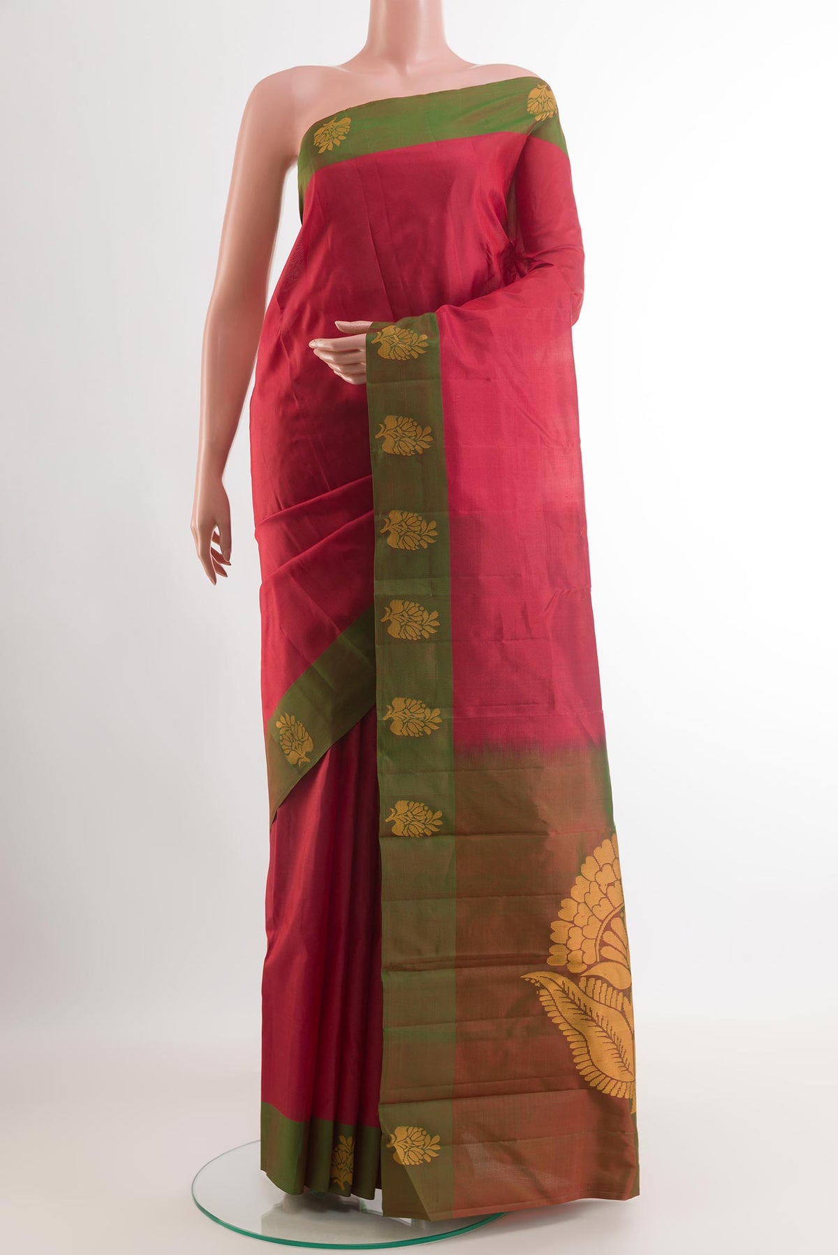 Maroon Kanjivaram Silk Saree with Plain Body and Thread Border.  displayed on a mannequin