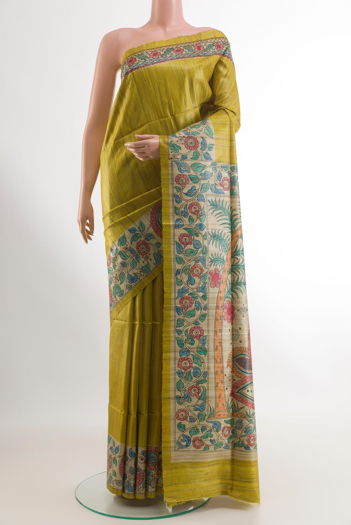 Mehandi Green Tussar Saree with Plain Body and Printed Border.  displayed on a mannequin