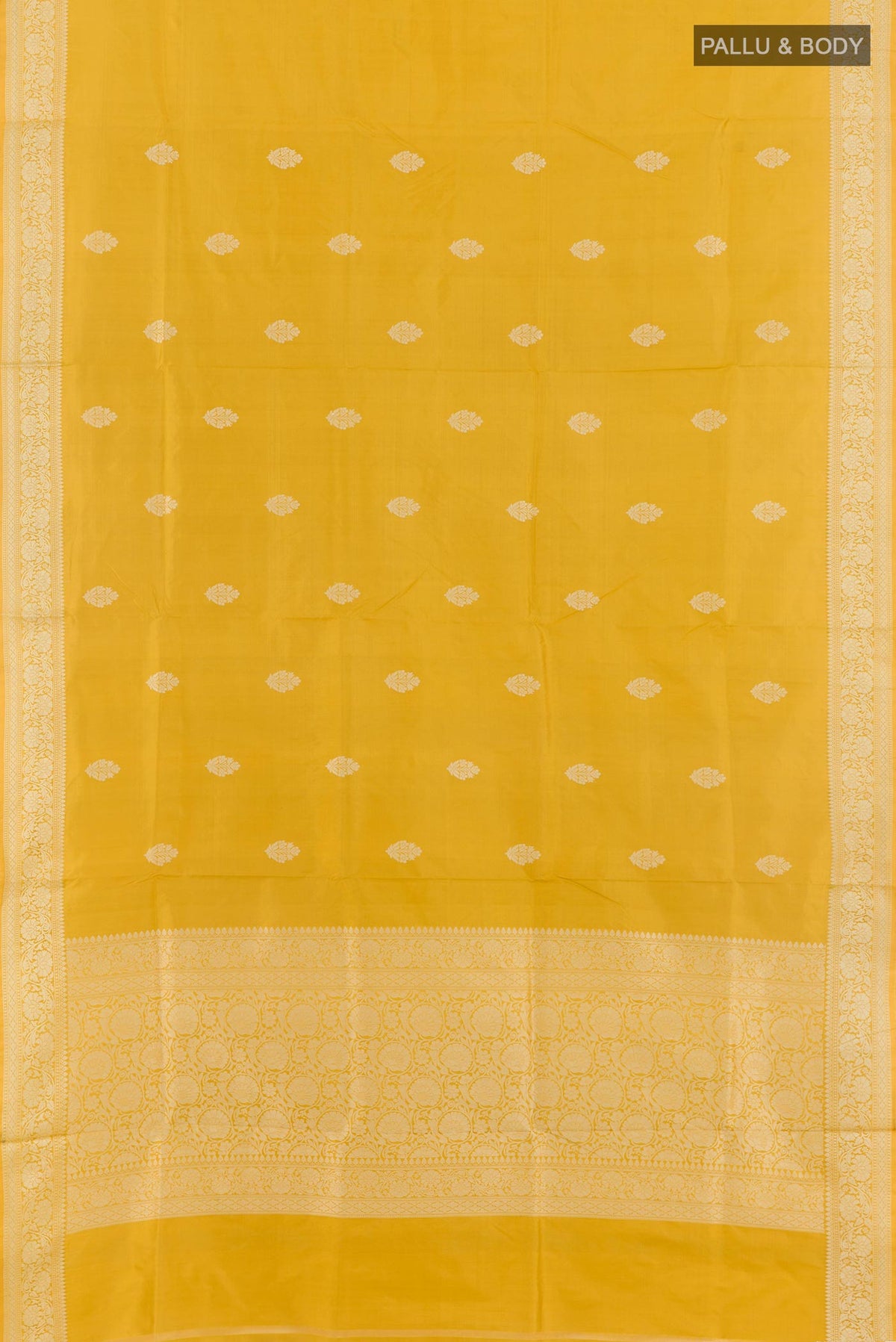 Flat view of Yellow Banarasi Katan Silk Saree with Zari Butta on the body and Zari Border. 