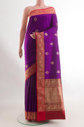 Purple Banarasi Katan Silk Saree with Zari Butta on the body and Zari Border.  displayed on a mannequin