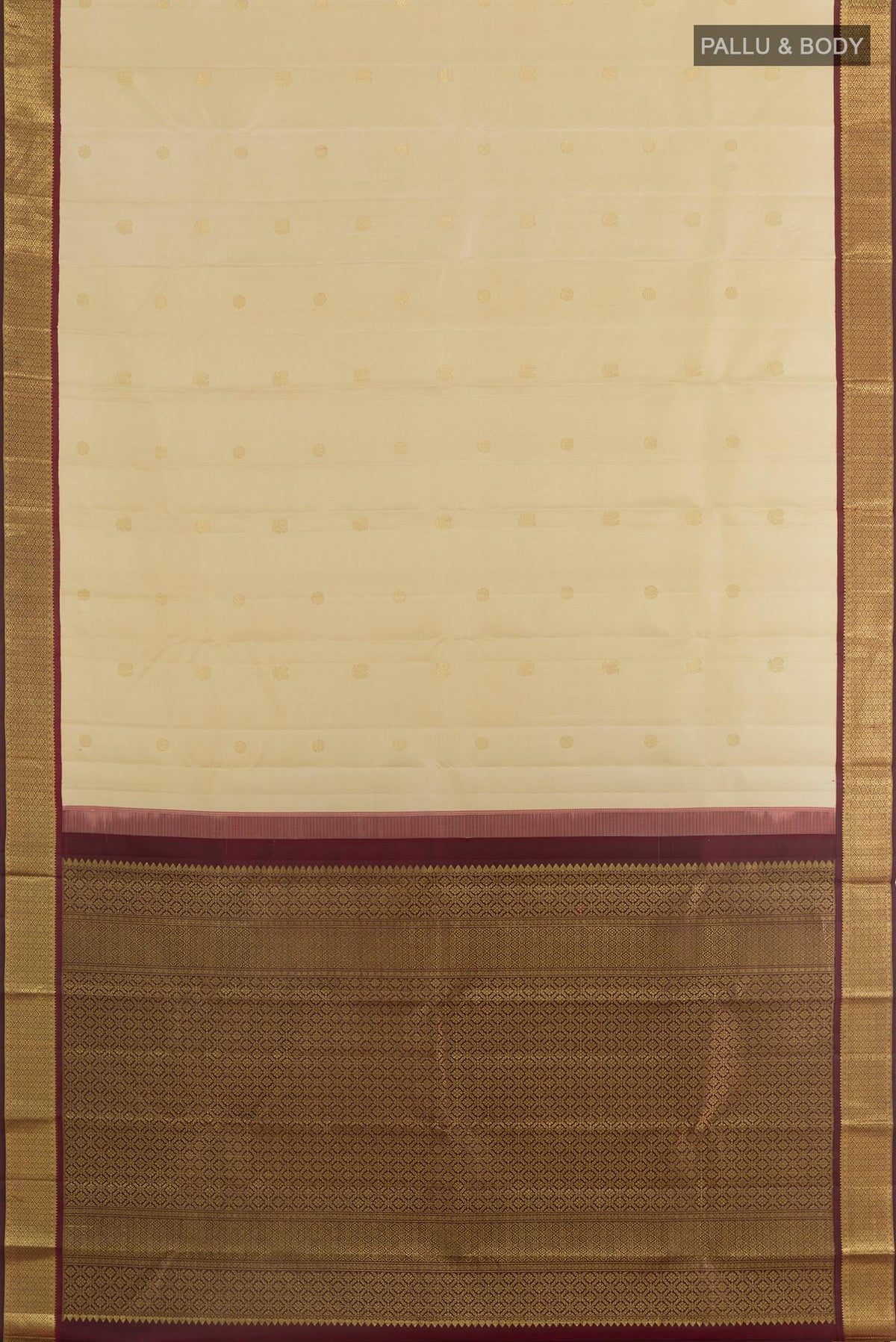 Flat view of Cream Kanjivaram Silk Saree with Zari Butta on the body and Zari Border. 