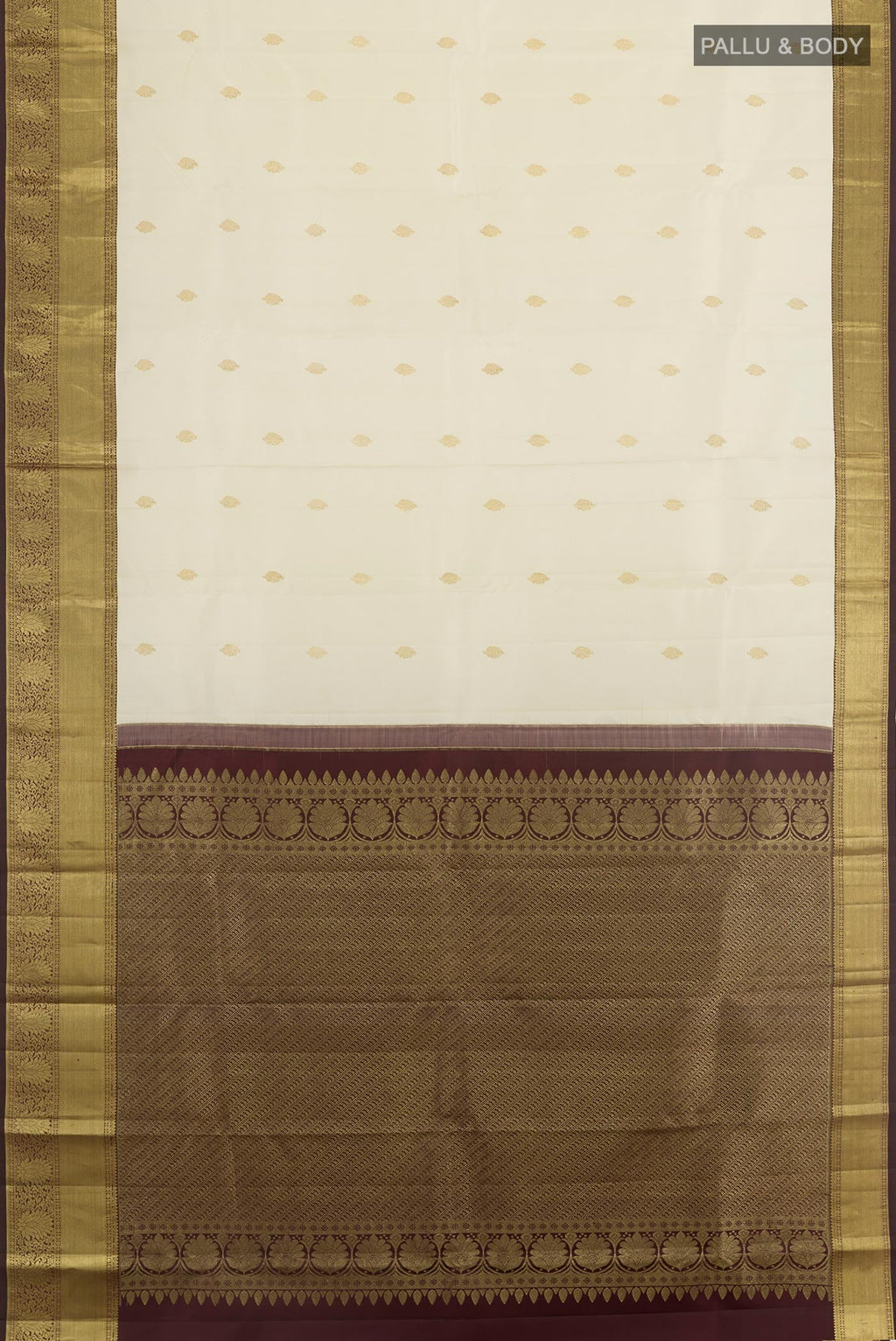 Flat view of Off White Kanjivaram Silk Saree with Zari Butta on the body and Zari Border. 
