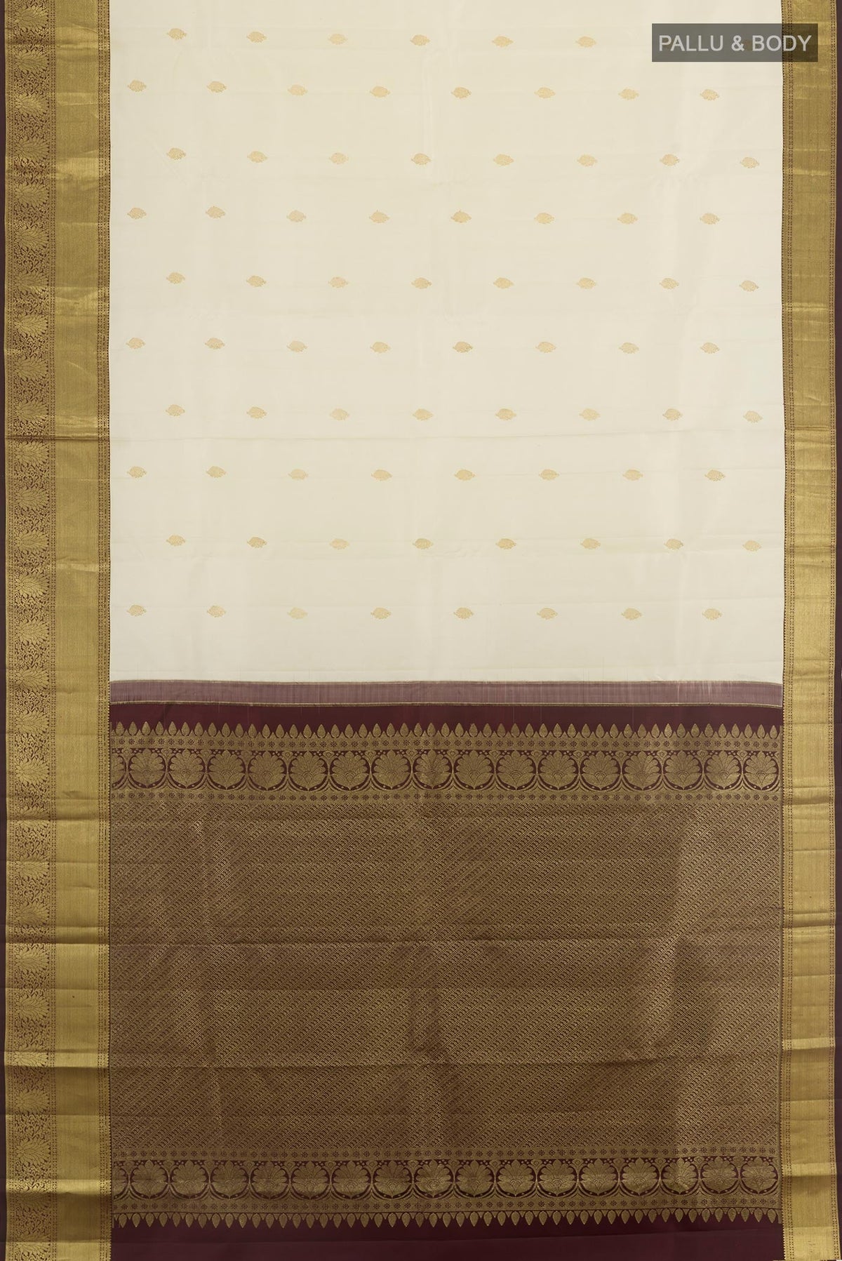 Flat view of Off White Kanjivaram Silk Saree with Zari Butta on the body and Zari Border. 
