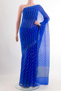 Blue Chiffon Saree with Stripes on the body and Zari Border.  displayed on a mannequin