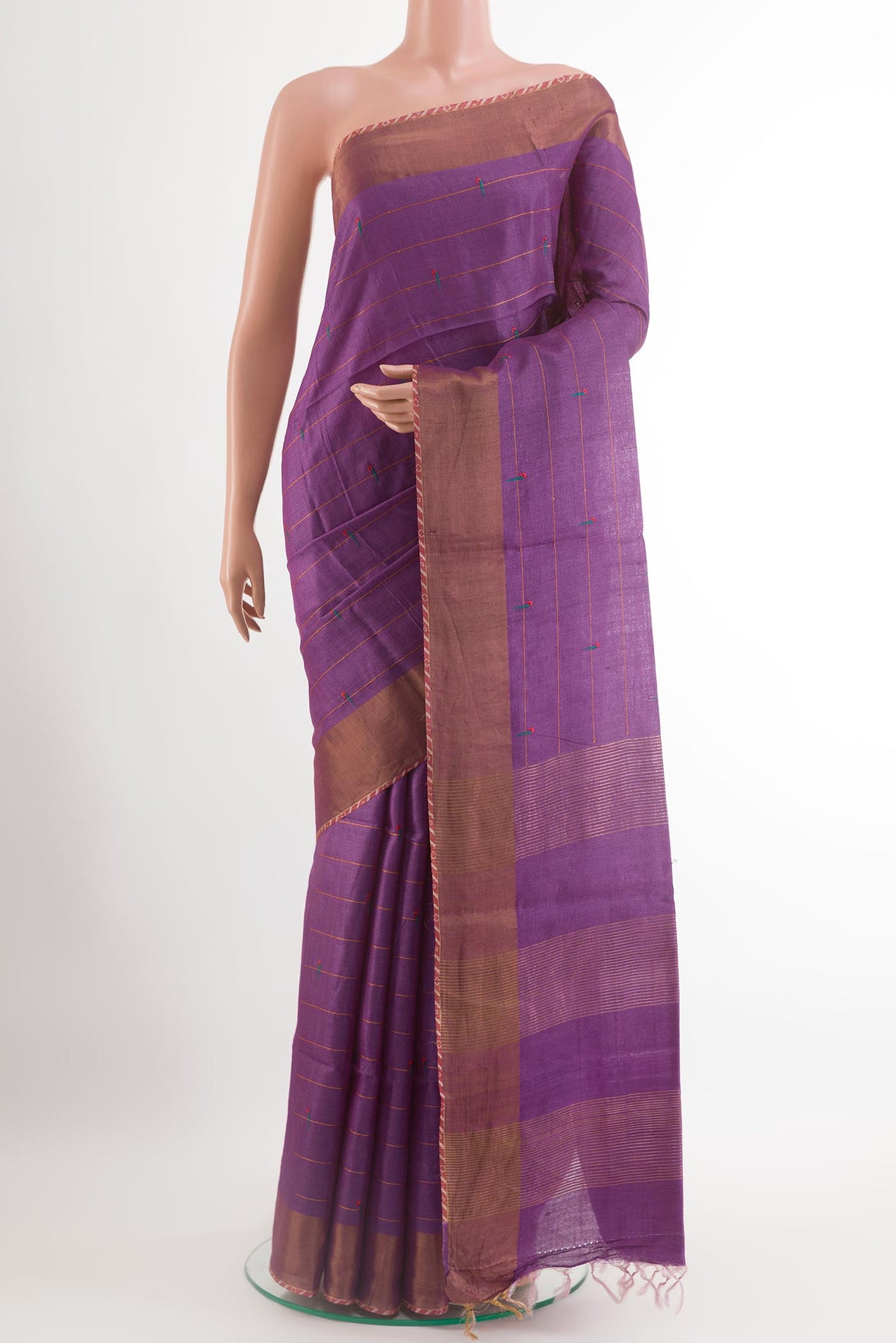 Purple Tussar Saree with Thread Butta on the body and Zari Border.  displayed on a mannequin